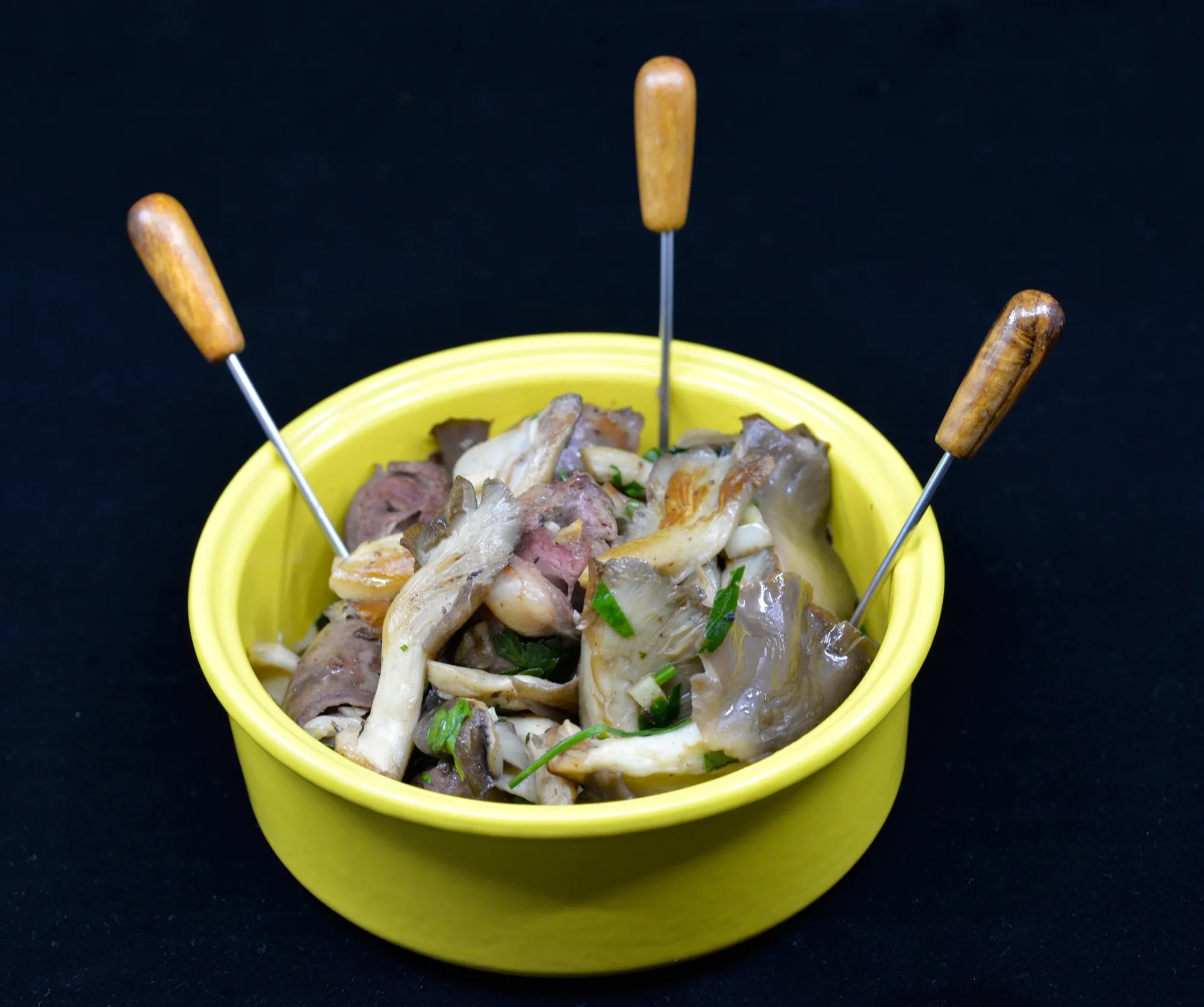 Cœurs de canard & pleurotes persillés